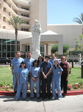 Photo of the FeverLab team (June 2004) in front of St. Joseph's Hospital.